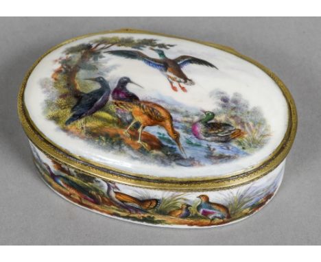 An 18th/19th century Continental gilt metal mounted porcelain snuff box
Of oval section, decorated with various birds and wat
