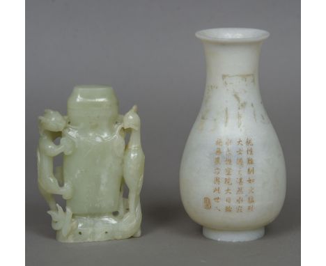 A Chinese mutton fat jade vase
Of ovoid form, with calligraphic decoration, the underside with four character mark; together 