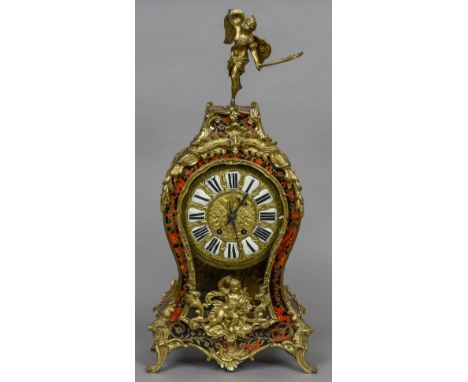 A 19th century French ormolu mounted boulle bracket clock
The stepped top surmounted with a horn playing angel above the cast