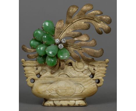 A Chinese 14 ct gold diamond, jade and ivory set brooch
Formed as an urn of floral sprays, the reverse stamped Hong Kong.  5.