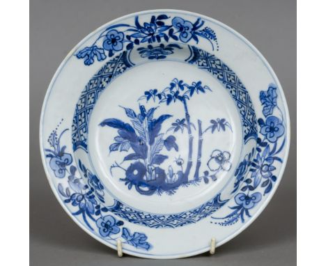 A Chinese blue and white porcelain dish
Decorated with floral sprays, possibly Kangxi.  23 cm diameter.  CONDITION REPORTS: G