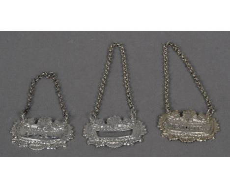 A pair of George III decanter labels, hallmarked London 1819, maker's mark of George Knight
Inscribed Port and Madeira; toget