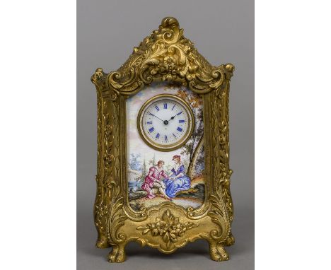 A Swiss enamel decorated desk clock
The ormolu case of vitrine form, centred with a white enamel dial surrounded by an enamel