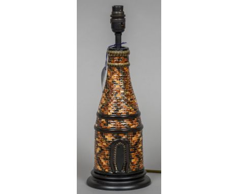 A modern Moorcroft pottery table lamp
Formed as a brick pottery kiln.  36.5 cm high. CONDITION REPORTS: Generally in good con