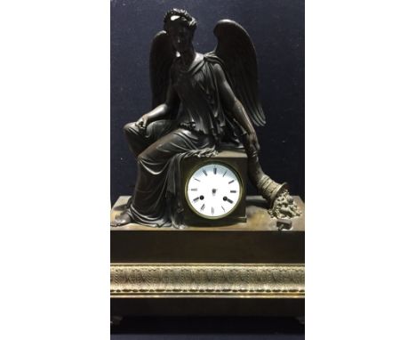A 19th century bronzed cased figural mounted mantel clock The stepped case with acanthus cast band, surmounted with the seate