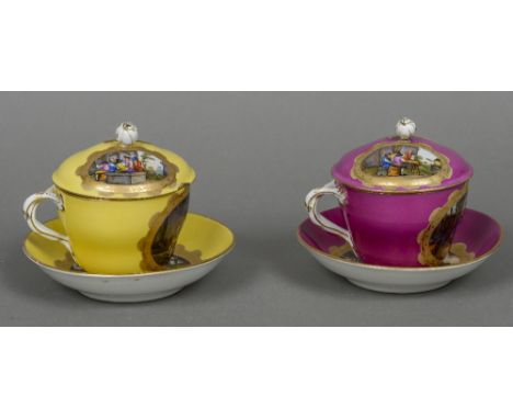 A pair of late 19th century Dresden covered cabinet cups and saucers
Each piece painted with a panel depicting a vernacular s