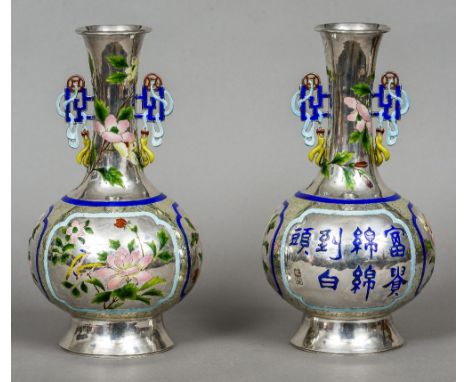 A pair of late 19th/early 20th century Chinese Export silver and enamel twin handled vases Of baluster form, decorated with f