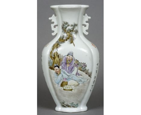 A Chinese porcelain twin handled vase Of lobed form, decorated with figures playing Go, opposing figures in a garden interspe