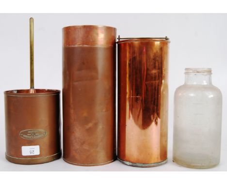 RAIN GAUGE; A copper rain gauge, first half 20th century, the gauge of cylinder form opening to reveal a clear bottle. Marked