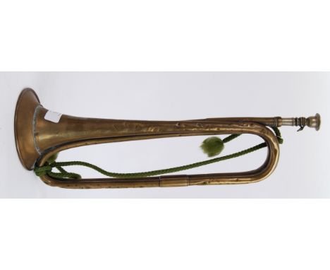 FIRST WORLD WAR TRUMPET: An original First World War WWI issue military trumpet. Brass construction, with original green sash