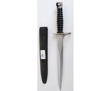 BAYONET: A 20th century Dutch Army bayonet dagger complete with composite scabbard. The shaped blade marked F+W with addition