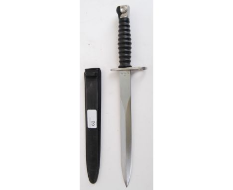 DAGGER: A 20th century Dutch Army bayonet dagger complete with composite scabbard. The shaped blade marked F+W with additiona