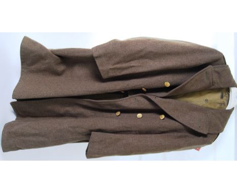 GREAT COAT: A Second World War WWII believed American issue uniform great coat having lined interior with clover army patch e