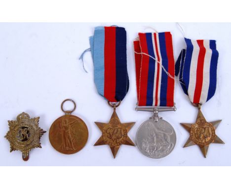 MEDAL GROUP: A group of First World War WWI Medals belonging to 201517 Driver W. Moss, Royal Artillery, along with his WWII S