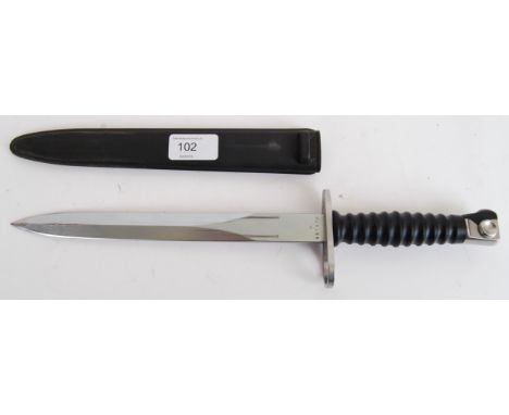 BAYONET: A 20th century Dutch Army bayonet dagger complete with composite scabbard. The shaped blade marked F+W with addition