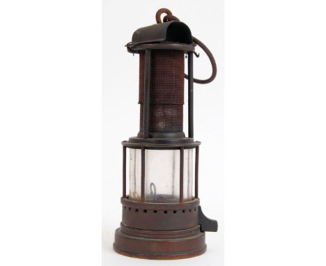 CLANNY LAMP: A rare 19th century miners Clanny Lamp. Brass, with circular top, with pierced vent holes, supported by three br