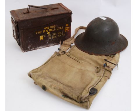 MILITARY MISC: A British military issue helmet dating to the First world war together with a British military ammunition tin 