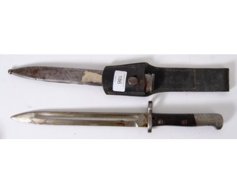 BAYONET: A Polish Mauser bayonet, OE over WG to the ricasso. 08184 stamped to scabbard. Complete with leather holster.

NOTE: