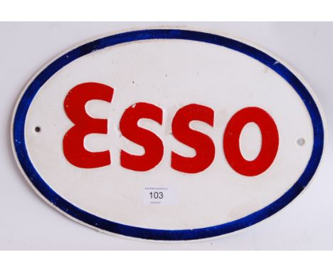 ESSO: A reproduction Esso garage advertising hand painted iron sign. Blue rim, with white background and raised red lettering