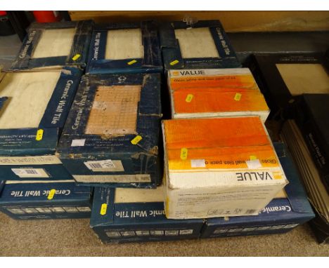 Good quantity of ceramic wall and floor tiles in boxes