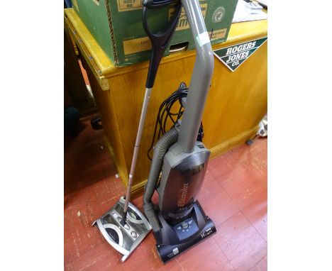 Electrolux upright vacuum cleaner and a Light 'n' Easy Carpet Wizard Ewbank