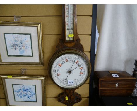 Good vintage oak wall barometer with thermometer and leaf carved detail