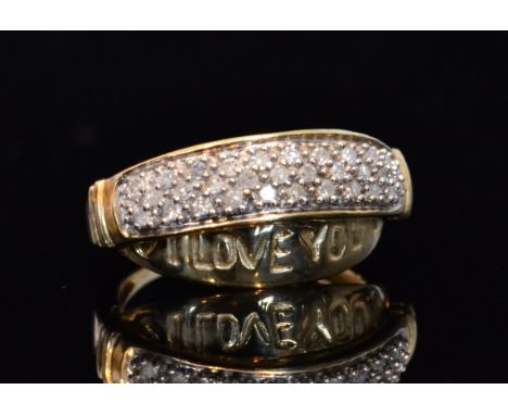 A 9ct diamond ring three rows of pave set diamonds to a wide head and tapering shoulders, ring size N. 