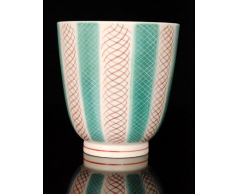 A Poole Pottery Freeform footed vase decorated in pattern PKT, shape 180, printed and impressed marks, height 19cm