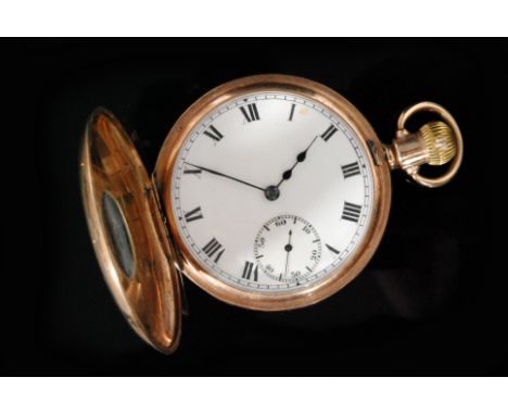 A 1920s hallmarked 9ct half hunter keyless pocket watch, the white enamel dial with Roman numerals and subsidiary seconds dia