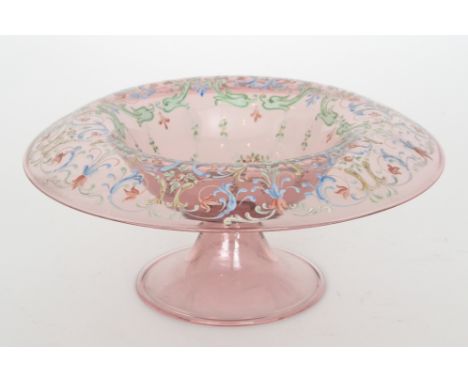 A 1930s Italian Venetian glass bowl of footed circular form with a deep roll rim, enamel decorated with rococo scrolls, styli