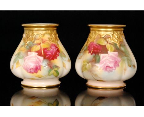 A matched pair of Royal Worcester cache pots of lobed form and decorated with a hand painted crimson and pink rose, Hadleys s