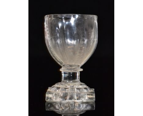 A late 18th Century Montieth with a fluted bowl raised to a stepped base with lemon squeezer foot, height 8cm. 