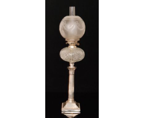 An early 20th Century hallmarked silver Corinthian column oil lamp terminating in compressed circular diamond cut reservoir, 