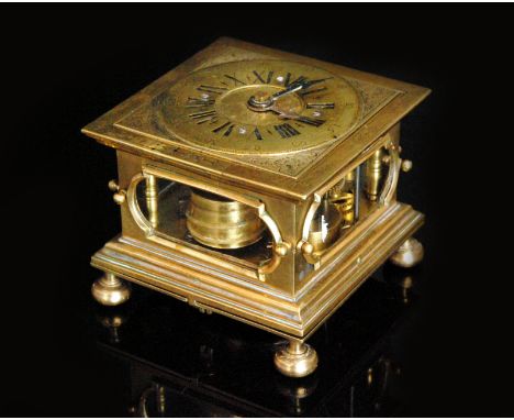 A brass Augsburg style table clock, single verge movement striking on a bell, Roman and Arabic numerals to brass dial within 