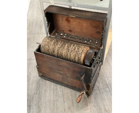 A Chiapia 26 note street barrel organ, rosewood veneer case a/f. Originally played with a strap and a stick to take the weigh