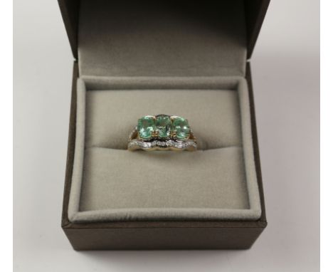 Siberian emerald and diamond ring stamped 18k 750  Condition Report Click here for further images, condition, auction times &