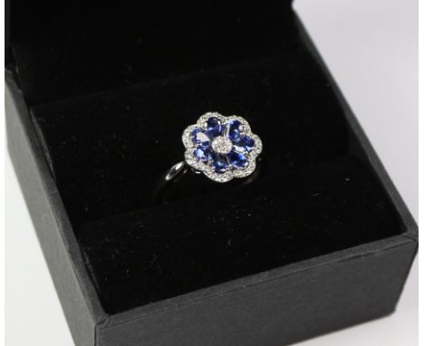 Sapphire and diamond flower set white gold ring stamped 585 14k Condition Report Click here for further images, condition, au