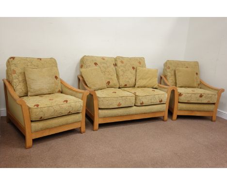 Cintique light oak framed two seat sofa (L140cm) and pair of matching armchairs (W90cm) upholstered in beige fabric Condition