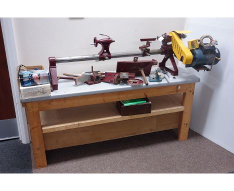 The 'Major' Coronet Tool Co. adjustable speed woodworking lathe on bench, with various accessories and chucks  (This item is 
