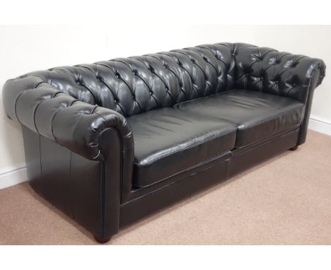 Four seat Chesterfield sofa upholstered in deeply buttoned black leather, W220cm Condition Report Click here for further imag