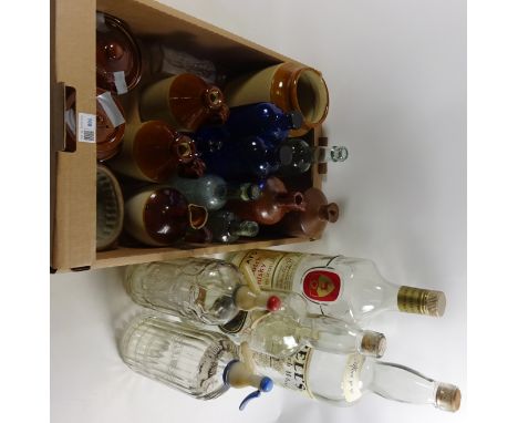 Two soda siphons, large Scotch Whisky bottles, other vintage glass bottles and stoneware jars Condition Report Click here for