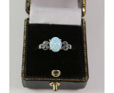 Opal and marcasite ring stamped 925 Condition Report Click here for further images, condition, auction times & delivery costs