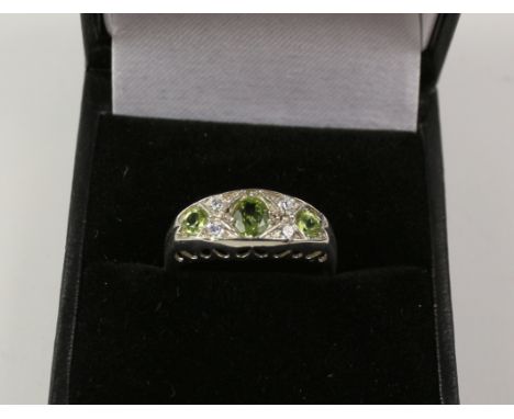 Peridot dress ring stamped sil Condition Report Click here for further images, condition, auction times & delivery costs