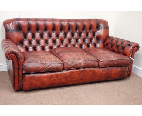 Three seat traditional sofa upholstered in deeply buttoned vintage red leather, W190cm Condition Report Click here for furthe