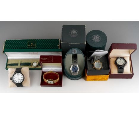 Six assorted wrist watches, comprising a boxed Gucci watch with warranty dated 1997, A boxed Hublot, a boxed Rotary, a boxed 