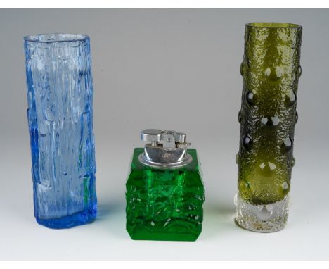A Whitefriars style green "Bark" glass table lighter, mechanism stamped Japan together with a Ravenshead blue bark vase, appr
