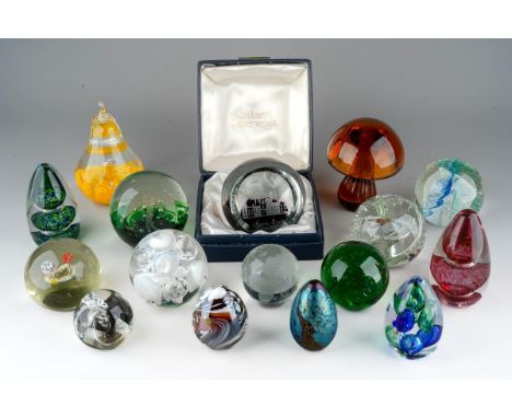 A collection of mixed glass paperweights to include: Wedgwood amber mushroom; Caithness Ruffles, Caithness Mooncrystal, Caith