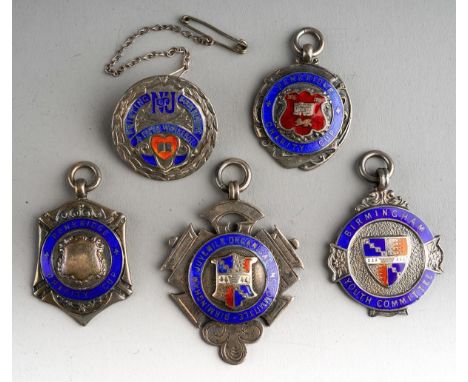 Five early 20th Century silver and enamel medals to include: Penkridge Charity Cup 1924-5, another similar; Chamberlain Cup F