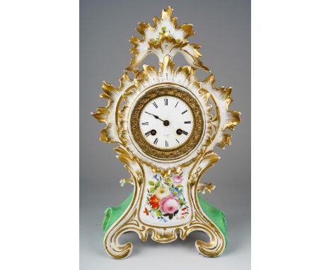 A Continental porcelain mantle clock, stylised sun burst motifs on scroll supports, painted with flowers, drum movement with 