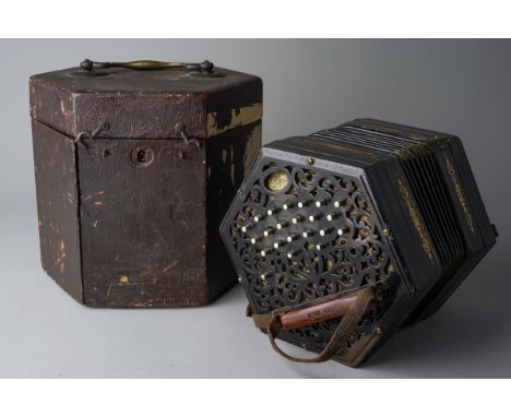 Cased 19th century Lachenal Anglo system 39 key Concertina. Fretted ebony ends with nickel buttons.